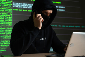 hacker using mobile smartphone calling for victim