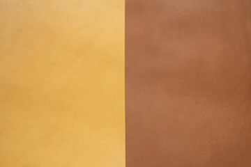 Combined background from natural light brown and dark brown leather