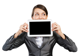 Businesswoman with tablet computer looking away