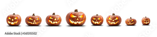 A group of eight lit spooky halloween pumpkins, Jack O Lantern with evil face and eyes isolated against a white background.