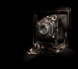 old retro film camera, black