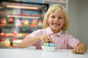 little boy with birthday cake