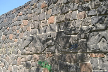 wall with Scythian ornaments. Summer