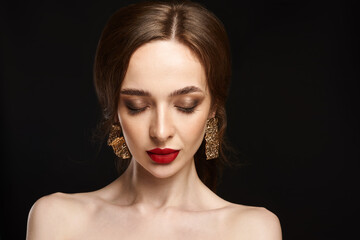 High Fashion Model Girl Portrait with Trendy Hair style and Makeup. Long Black Hairstyle, Black Hair and Red Matte Lipstick. Woman Makeup. Sexy Lips. Haircut