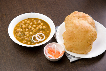 Channa Masala with Puri or Kabuli Chana with bhutara or spicy Chole, Indian Food