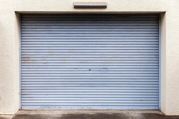 Illuminated grunge metallic roller white shutter door	