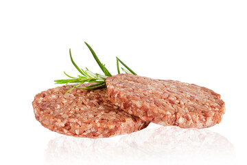 Raw burger cutlets made from minced fresh meat with rosematy isolated on white background.