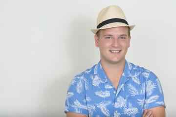 Portrait of happy tourist man with blond hair