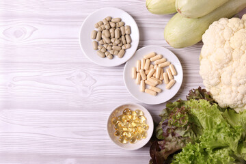 farm fresh vegetables and medical pills as a concept of comparison in healthy diet and vitamin supplies