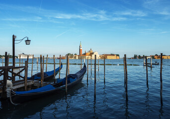 Fototapeta na wymiar Gondolas on Grand Canal and San Giorgio Maggiore church in Venice