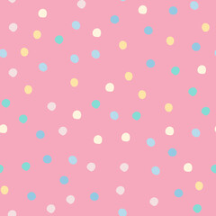 Abstract colored polka dots seamless pattern on pink background. Cute circle shapes wallpaper.