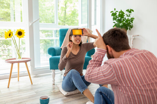 Couple Having Fun Playing Charades