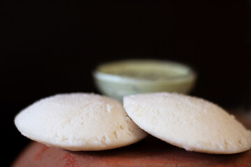  idly or rice cake, originating from the Indian subcontinent, popular as breakfast foods in southern India