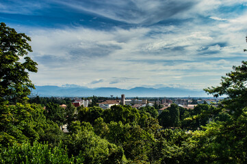 Panoramic view from above with a dome and roofs of the city of Udine, Italy