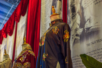 Obraz premium displaying Ao dai and Vietnamese traditional costumes during street festivals in Nguyen Hue street, Ho Chi Minh city, Vietnam