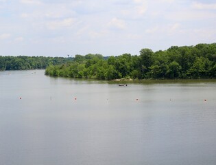 The peaceful day at the lake in the countryside on a sunny day.
