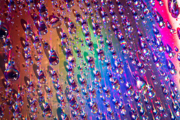 water drops on dvd media, water drops on colorful background