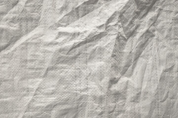 Crumbled paper with cube texture background 
