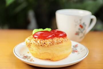 Fancy donuts on white plate