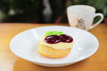 Fancy donuts on white plate
