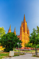 Naklejka premium Evangelical Market Protestant church Wiesbaden or Marktkirche neo-Gothic style building on Schlossplatz Palace Square in historical city centre, blue sky background, State of Hesse, Germany