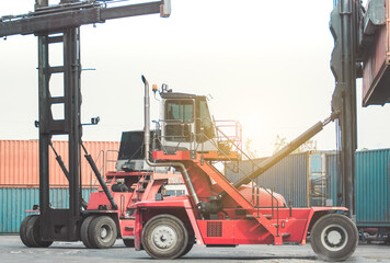 Folklift for loading containers at logistics warehouse