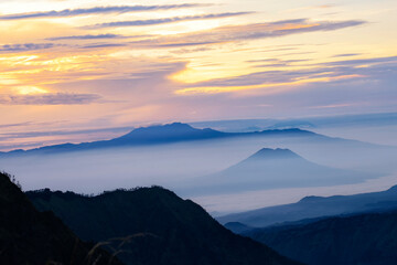 Fototapeta na wymiar Bromo Mountain and fog around bromo mountain, in East Java, Indonesia. Indonesian call Gunung Bromo.