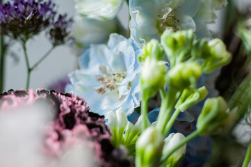 Bouquet of flowers. Stylish bouquet. Macro photos of different colors. Selective focus. Artistic style.