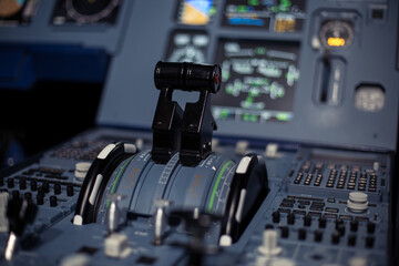 Control aviation panel of plane in cockpit. Plane cockpit with many function to control. Engine control wheel. Aviation dashboard in bussiness aviation.