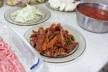Preparation of lasagne.