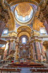 Fototapeta na wymiar Rome, Italy - home of the Vatican and main center of Catholicism, Rome displays dozens of historical, wonderful churches. Here in particular the San Carlo al Corso basilica