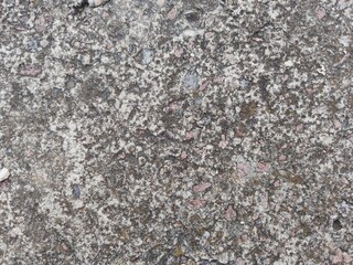 Textures of an old concrete wall, destroyed by time.