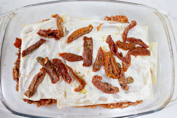 Preparation of lasagne.