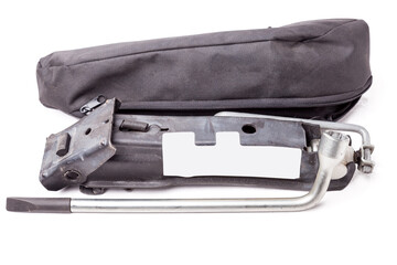 A set for replacing wheels - a dock, a metal long key and a bag cover after an accident or breaking a tire on the road, is required for storage in the car when traveling and traveling.