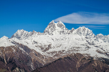 Fototapeta premium panorama of Georgia mountains Uzhba and snow hat glaicer