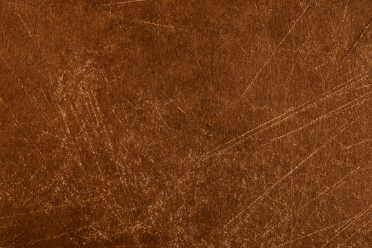 brown vintage stone with scatches and dust, textured surface with copy space, macro shot