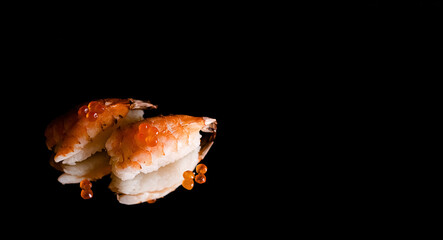 Sushi and role on the reflective surface, black background. concept of healthy traditional Japanese cuisine. selective focus. - Powered by Adobe