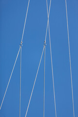 Equipment for yachting, ropes on a blue sky background
