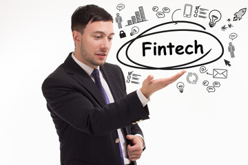 Business, technology, internet and network concept. Young businessman thinks over the steps for successful growth: Fintech