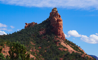 Fototapeta na wymiar The beauty of one of Sedona's landmark sandstone formations known as Coffee Pot on a clear spring day.