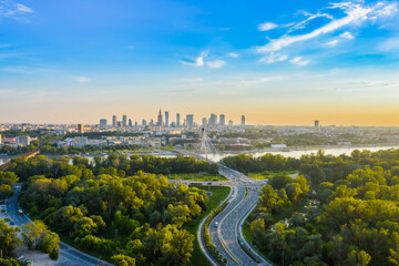 Beautiful panoramic aerial drone view to the Center of modern Warsaw city with silhouettes of...