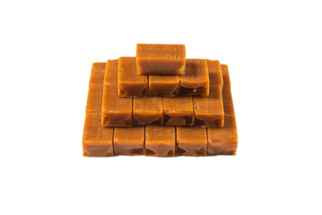 Tasty caramel candy isolated on white background.