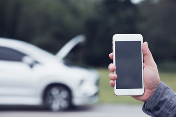  man using smart phone for help.concept car service.