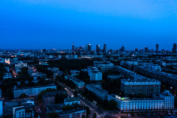 Naklejka na ściany i meble Beautifu evening panoramic aerial drone view to the Center of modern Warsaw city with skyscrapers
