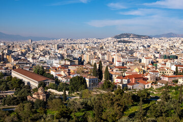 Fototapeta na wymiar Panoramic view of metropolitan Athens, Greece with Athenian Agora and Attalus, Stoa of Attalos, seen from Acropolis hill