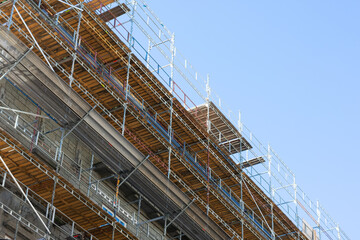 Building skyscrapers or multi-storey building in scaffolding poles. Special construction for...