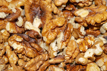 Peeled walnuts close-up. Surface texture. Healthy diet.