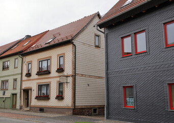 typical slated facades of old houses in thuringia in Germany