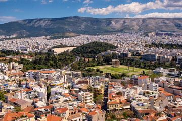 Fototapeta na wymiar Panoramic view of metropolitan Athens with Temple of Olympian Zeus - Olympieion - seen from Acropolis hill in Athens, Greece