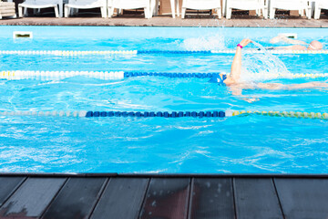 pool with swimming paths, summer sports background.